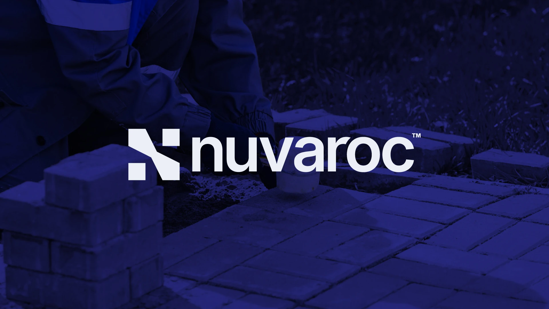 Nuvaroc logo over a blue-toned construction site background.